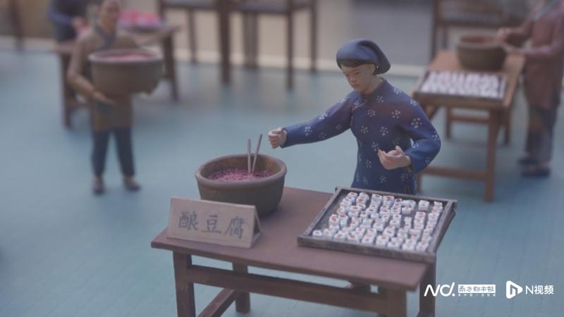 “百家鲜客家女奇妙乐园”内展示的客家酿豆腐的制作过程。南都、N视频记者陈灿荣 摄
